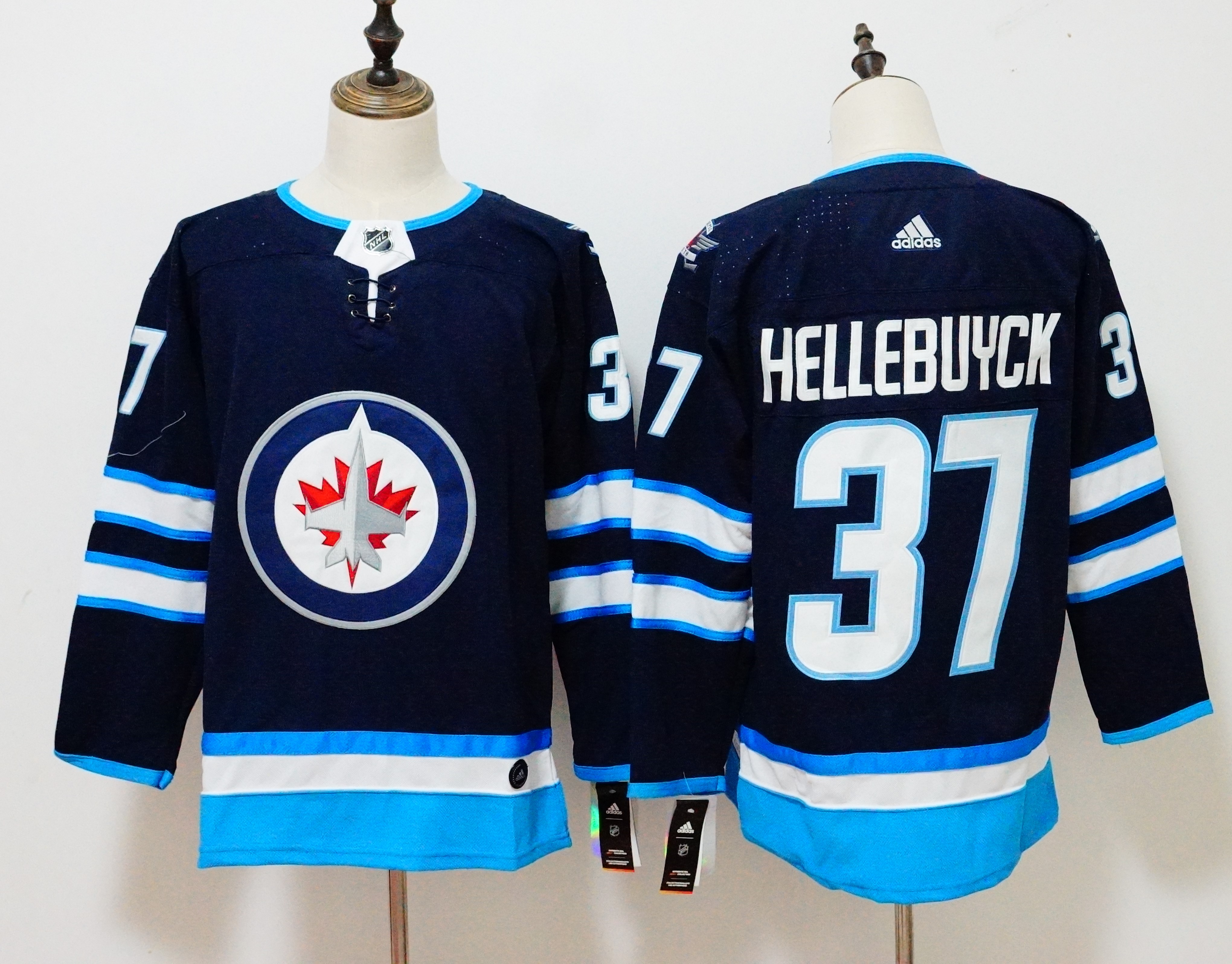 Men's Adidas Winnipeg Jets #37 Connor Hellebuyck navy Stitched NHL Jersey